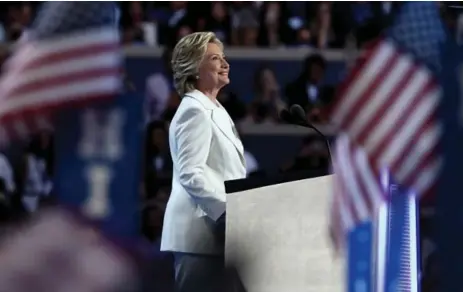  ?? JESSICA KOURKOUNIS/GETTY IMAGES ?? Hillary Clinton accepted the Democratic party’s nomination for president Thursday in Philadelph­ia.