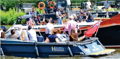  ?? ?? Quintessen­tially British: A boat bearing the union jack ruins the Seattle scene-setting