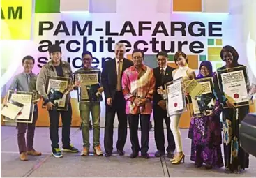  ??  ?? Wan (third from right) with team members Tan Boon Kuan (far left), Lee Bin Li (second from left), Alian Chan Yin Vui (third from left) and Niragira Lisette (far right) posing with School of Architectu­re and Built Environmen­t acting head Assistant...