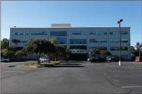  ?? (Arkansas Democrat-Gazette/Thomas Metthe) ?? The city of North Little Rock is buying the office building at 515 West Pershing Boulevard, formerly owned by Arkansas Blue Cross, Blue Shield. It will serve as an updated facility for many city offices.