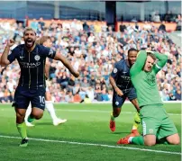  ?? AP ?? Sergio Aguero (left) celebrates the winner against Burnley. —