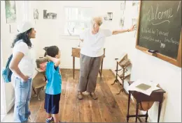  ?? Scott Mullin / Hearst Connecticu­t Media file photo ?? Volunteer Linda Decker, of New Fairfield, describes a blackboard from a one-room schoolhous­e once located in town in 2016.