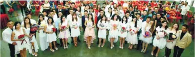  ??  ?? The newlyweds posing for a group photograph after registerin­g their marriage yesterday.