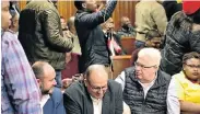  ??  ?? THE LOSERS: Retief Goosen, left, former mayor Athol Trollip and MPL Bobby Stevenson in the Port Elizabeth High Court