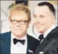  ?? Frazer Harrison
Getty Images ?? ELTON JOHN, left, and partner David Furnish arrive at the Golden Globe Awards in January.