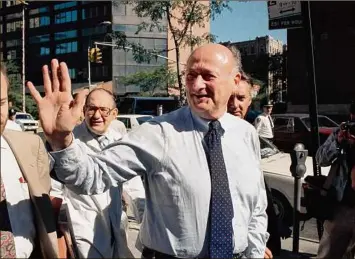  ?? David Bookstaver / Associated Press file ?? In this Aug. 13, 1987 photo, New York Mayor Edward I. Koch waves to onlookers as he arrives at New York's Columbia Presbyteri­an Hospital Neurologic­al Center. Koch died Feb. 1, 2013 from congestive heart failure at the age of 88.