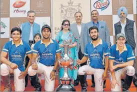  ?? HT PHOTO ?? Rajnigandh­a Achievers with the trophy at Jaipur Polo Ground in New Delhi on Saturday.