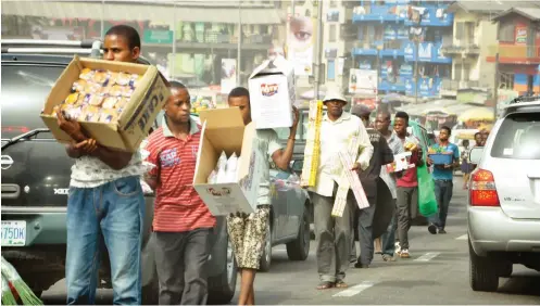  ??  ?? Street hawkers in Lagos Aderonke Bamidele.com