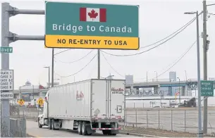  ??  ?? NO TURNING BACK: A commercial truck heads for the Ambassador Bridge which connects Detroit, Michigan to Windsor, Ontario.