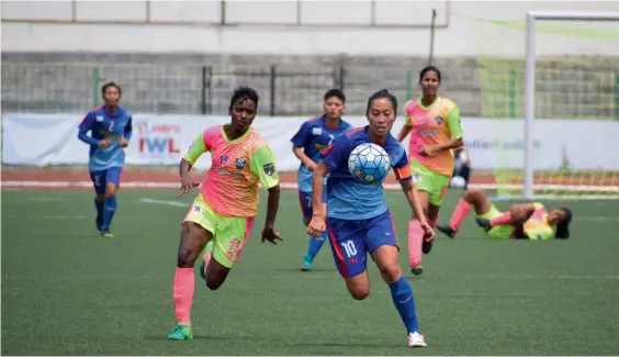  ??  ?? Action from the Indian Women’s League match between Kangchup Road Young Physical & Sports Associatio­n and Sethu FC in Shillong on Tuesday. Kangchup Road won 5- 0.