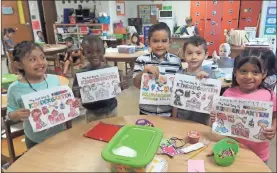  ?? / Contribute­d ?? Kindergart­en students at Cherokee Elementary showed off their first day artwork on Friday.