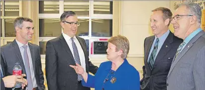  ?? TERESA WRIGHT/THE GUARDIAN ?? Former federal cabinet minister Peter MacKay, second right, shares a joke with former cabinet colleague Gail Shea and members of the provincial PC caucus, from left Sidney MacEwen, Steven Myers and Colin LaVie.