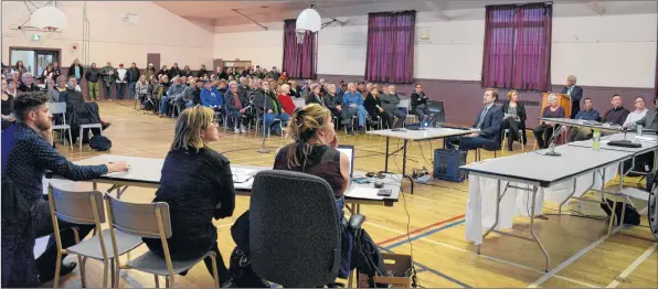  ?? COLIN CHISHOLM ?? A large crowd of over 200 people came out to learn more about Windsor’s proposed hockey arena project near Long Pond. Several people asked questions, some praising and others slamming the project’s merits.