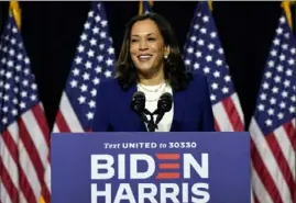  ?? Carolyn Kaster/Associated Press ?? Sen. Kamala Harris, D-Calif., speaks after Democratic presidenti­al candidate former Vice President Joe Biden introduced her as his running mate during a campaign event Wednesday at Alexis I. du Pont High School in Wilmington, Del.