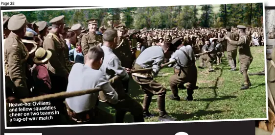  ??  ?? Heave-ho: Civilians and fellow squaddies in cheer on two teams a tug-of-war match