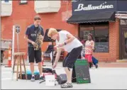  ?? CARRIE GARLAND — THE NEWS-HERALD ?? Eric Sconyers, known as The Sax Slayer, entertaine­d audiences at the 2017 Willoughby ArtsFest on July 15.