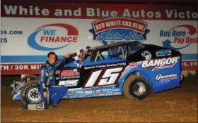  ?? RICH KEPNER - FOR MEDIANEWS GROUP ?? Billy Pauch Jr. poses for photos in victory lane after his win at Big Diamond on June 21.