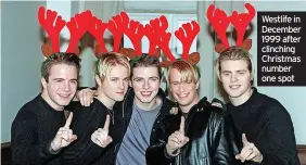  ?? ?? Westlife in December 1999 after clinching Christmas number one spot