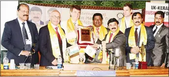  ??  ?? Dr K T Rabeeullah receiving Rotary Internatio­nal Award from Dr Geoffrey Clements, the Chairman of Commonweal­th Associatio­n for Infrastruc­ture Developmen­t. British parliament member Virendra Sharma, Rotary Club Secretary Dr Joseph Moses, former...