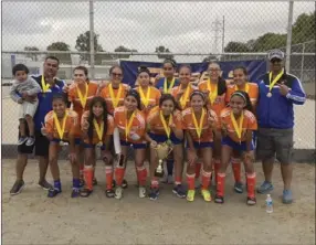  ??  ?? The members of Dynamo El Centro Soccer Club Girls' 2000 team smile for a photo after finishing in first place at the Rebels Cup Girls' Under 17 Silver Division. PHOTO COURTESY OF CARLOS LOPEZ