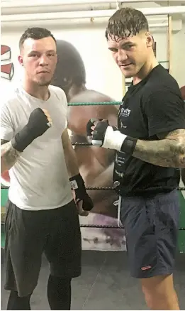  ??  ?? GYM LIFE: Butler alongside Scott Welch [above left], who is guiding Butler’s career, and Joel Mcintyre, who was another of Eubank’s sparring partners