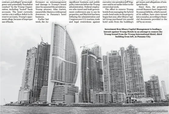  ??  ?? Investment firm Ithaca Capital Management is leading a lawsuit against Trump Hotels in an attempt to remove the Trump brand from the Trump Internatio­nal Hotel, third building from left, in Panama City. Arnulfo Franco / Associated Press