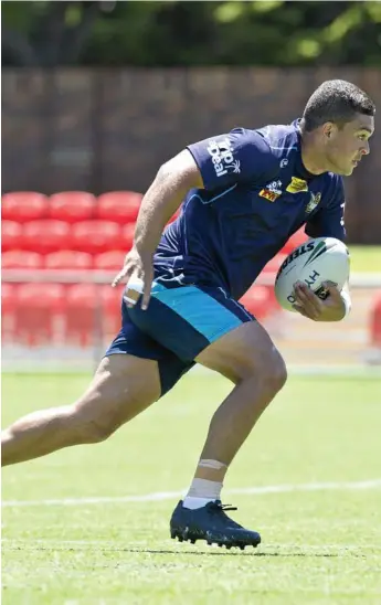  ?? Photo: Kevin Farmer ?? RETURNING HALF: Gold Coast Titans player Ashley Taylor is looking forward to tomorrow’s match against the St George Illawarra Dragons.