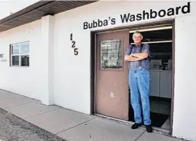  ?? Andrea Melendez / Associated Press ?? Richard Eggers stands at a Laundromat in Carlisle, Iowa, where he was arrested 49 years ago for putting a cardboard cutout of a dime in a laundry machine.