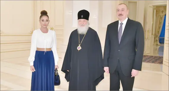  ??  ?? President Ilham aliyev and First Lady Mehriban Aliyeva meet with Patriarch Kirill of Moscow and All Russia