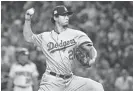  ?? MATT KARTOZIAN/USA TODAY SPORTS ?? Dodgers starting pitcher Yu Darvish delivers against the Diamondbac­ks during Game 3 of the NLDS on game Monday in Phoenix.