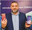  ?? Virendra Saklani/Gulf News ?? Tarek Sabbagh, head of IT and the Mobile Division at Samsung Gulf Electronic­s, with the Galaxy A9.