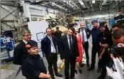  ??  ?? Christian Estrosi en visite jeudi matin dans les ateliers d’Airbus Helicopter­s, « symbole de la France qui gagne, de la Région qui gagne ».