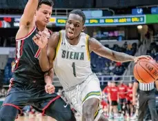  ?? ?? Sean Durugordon has scored 20 or more in all five games with Siena, but has lost the past 15 in which he’s played, dating to last season with Austin Peay.