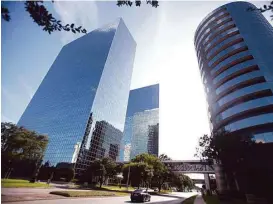  ?? Mayra Beltrán / Houston Chronicle ?? Greenway Plaza was sold for $950 million in 2013 by Crescent Real Estate Holdings to Atlanta-based Cousins Properties.