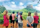  ??  ?? Bloggers enjoying a panoramic view of the Sigiriya rock