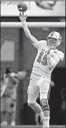  ?? AP/MARK WALLHEISER ?? N.C. State quarterbac­k Ryan Finley threw for 230 yards and two touchdowns Saturday to lead the Wolfpack over No. 12 Florida State.