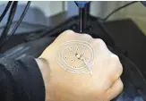  ?? MCALPINE GROUP, UNIVERSITY OF MINNESOTA ?? Electric circuits can also be 3D printed. Nanosilver can be printed directly onto the skin to combine electronic components into a temporary pulse meter.