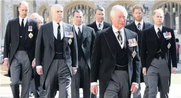  ??  ?? TIME TO TALK Harry, second from right, was seen speaking with brother William at funeral of Philip