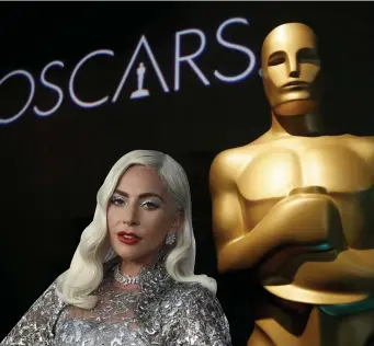  ?? AP FILE PHOTOS ?? EXTRA ENTERTAINM­ENT: For the first time in the U.S., Oscar watchers will be able to bet on their picks for the awards. Lady Gaga, left, was nominated for her role in ‘A Star is Born.’