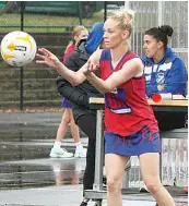  ?? ?? Buln Buln goal attack Paige Baker dishes off a pass as she makes a return to the court in A grade against Neerim South.