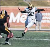  ?? HUNTER DYKE/GETTY ?? Vanderbilt’s Sarah Fuller kicks off to start the second half against Missouri on Saturday.