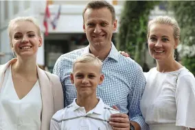  ?? ?? Family: Navalny, with wife Yulia, son Zakhar and daughter Daria