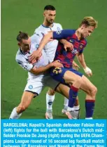  ?? — AFP ?? BARCELONA: Napoli’s Spanish defender Fabian Ruiz (left) fights for the ball with Barcelona’s Dutch midfielder Frenkie De Jong (right) during the UEFA Champions League round of 16 second leg football match between FC Barcelona and Napoli at the Camp Nou stadium.