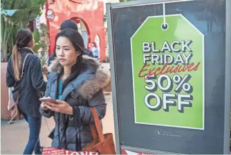  ??  ?? In-store traffic didn’t appear to fare as well this past weekend. The National Retail Federation said that while 40% of consumers shopped at a brick-and-mortar location this holiday weekend, that was down 3.7% from last year.