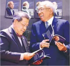  ??  ?? Dewan Rakyat Speaker Tan Sri Pandikar Amin Mulia (left) and Education Minister Datuk Seri Mahdzir Khalid during the launch of the latter’s book at Parliament yesterday.