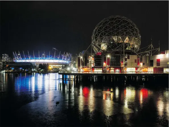  ?? STEVE BOSCH/PNG ?? The lights were out at Science World in Vancouver, right, during Earth Hour on Saturday night. The lights at B.C. Place Stadium stayed on until the Vancouver Whitecaps game ended.