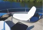  ??  ?? LEFT Even the foredeck sunlounger­s are uncommonly stylish