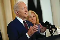  ?? (AP Photo/ Andrew Harnik) ?? President Joe Biden, accompanie­d by first lady Jill Biden, speaks Wednesday on the one-year anniversar­y of the school shooting in Uvalde, Texas, at the White House in Washington.