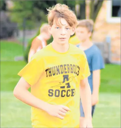  ?? JEFF VORVA/DAILY SOUTHTOWN ?? Sophomore Tyler Roney, a cancer survivor, plays baseball and soccer at Andrew.