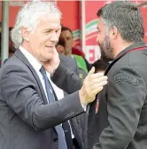  ?? (Ansa) ?? Convenevol­i Donadoni e Gattuso prima del match